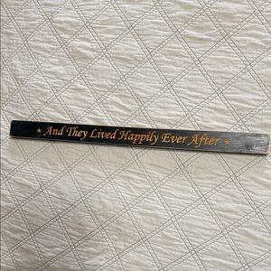 Black and Gold Decorative Sign